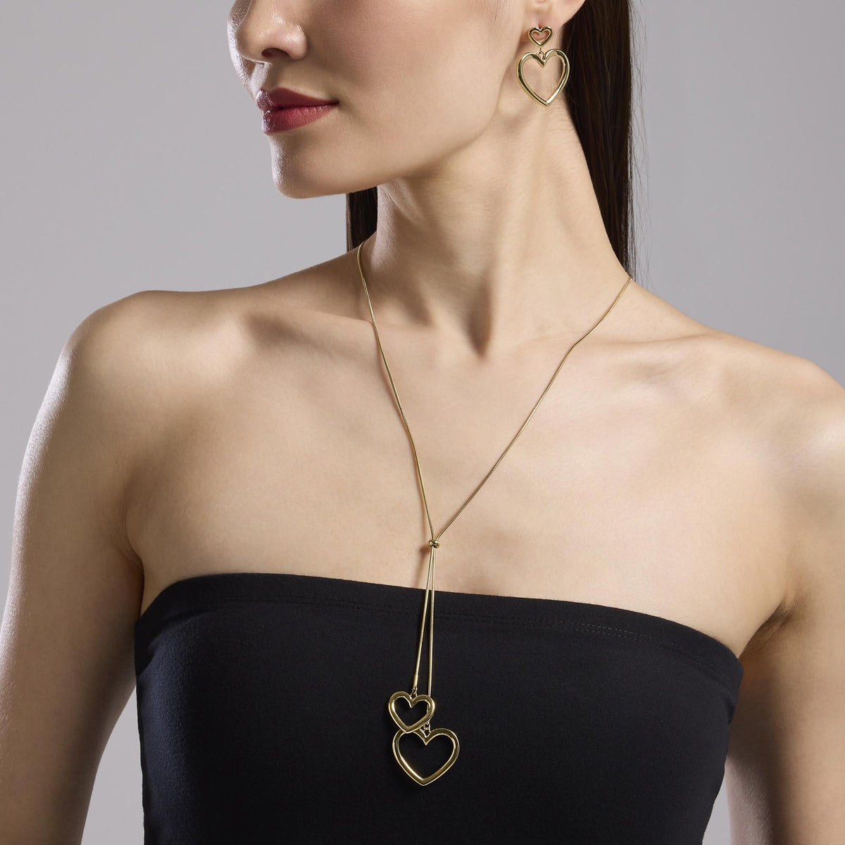 Orecchini in acciaio dorato con cuori Style 15