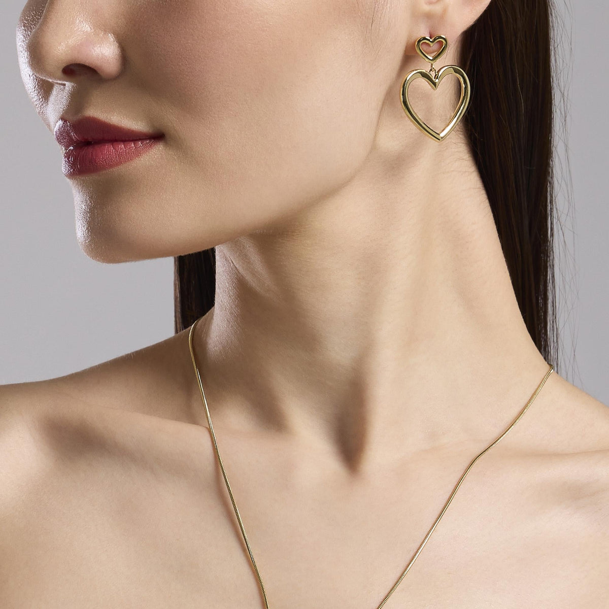 Orecchini in acciaio dorato con cuori Style 15
