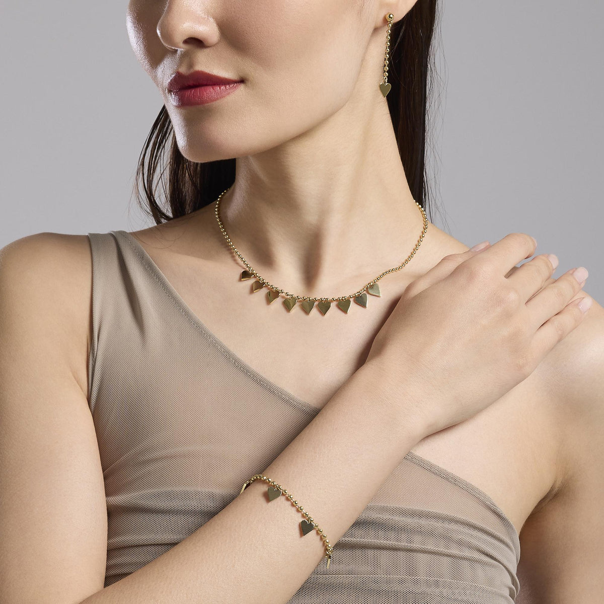 Orecchini pendenti dorati con cuori Style 18