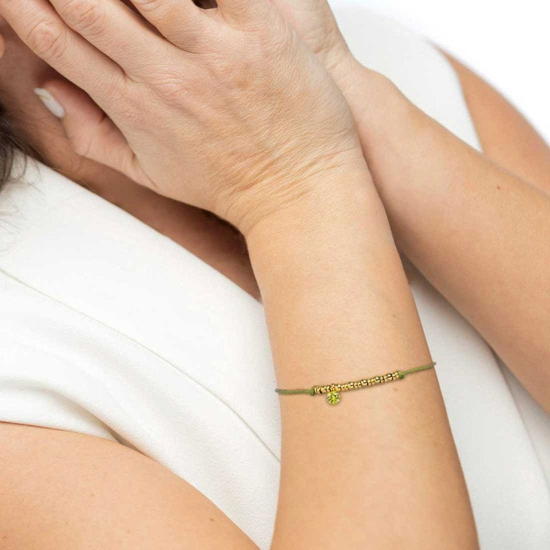 Bracciale cordino con elementi acciaio e zircone pendente