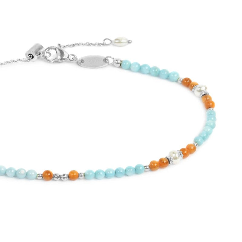 Cavigliera con elementi madreperla colorati e perle bianche irregolari